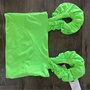 Anna Kaiser green ruffle top
